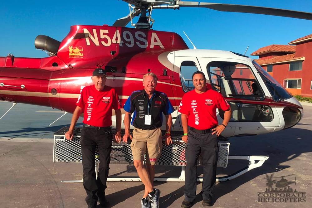 Corporate Helicopters at the SCORE Rosarito Beach Desert Challenge. Pictured: Ivor Shier (medevac pilot), Roger Norman (race organizer), Tom Perioni (flight Medic). Photo by Russ Stolzoff (chief flight paramedic).