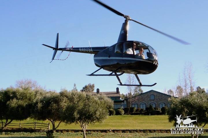 R44 Raven II flies on a helicopter tour
