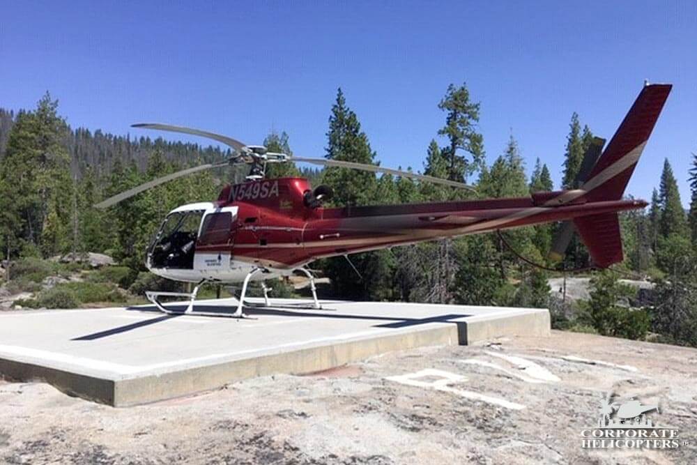 Checking Electrical Poles For Fire Risk Over the Sierra Nevada Mountains. Corporate Helicopters
